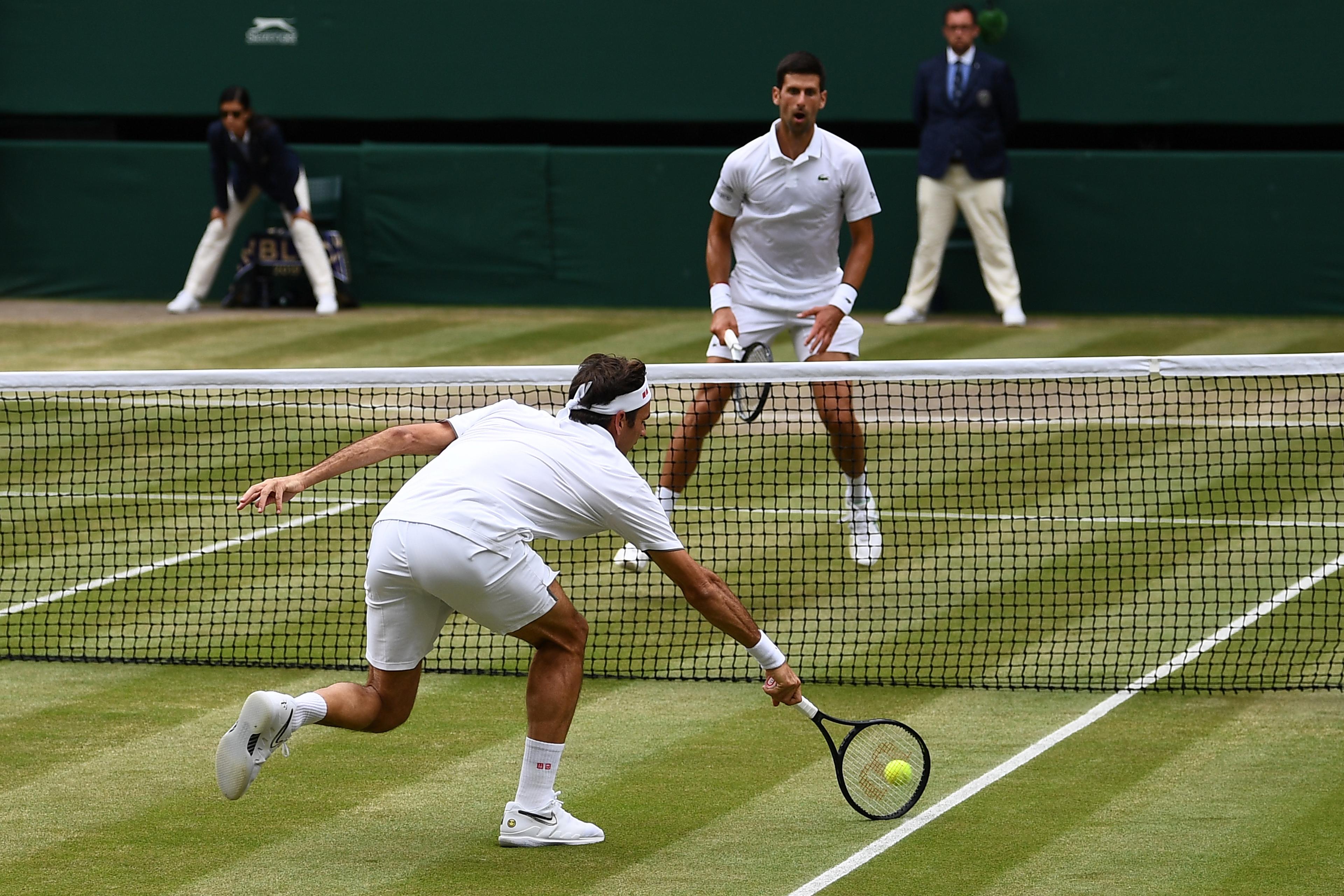 Novak Đoković i Rodžer Federer - Avaz