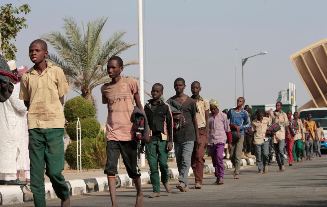 Freed Nigerian schoolboys walk after they were rescued by security forces in Katsina, Nigeria, December 18, 2020. - Avaz