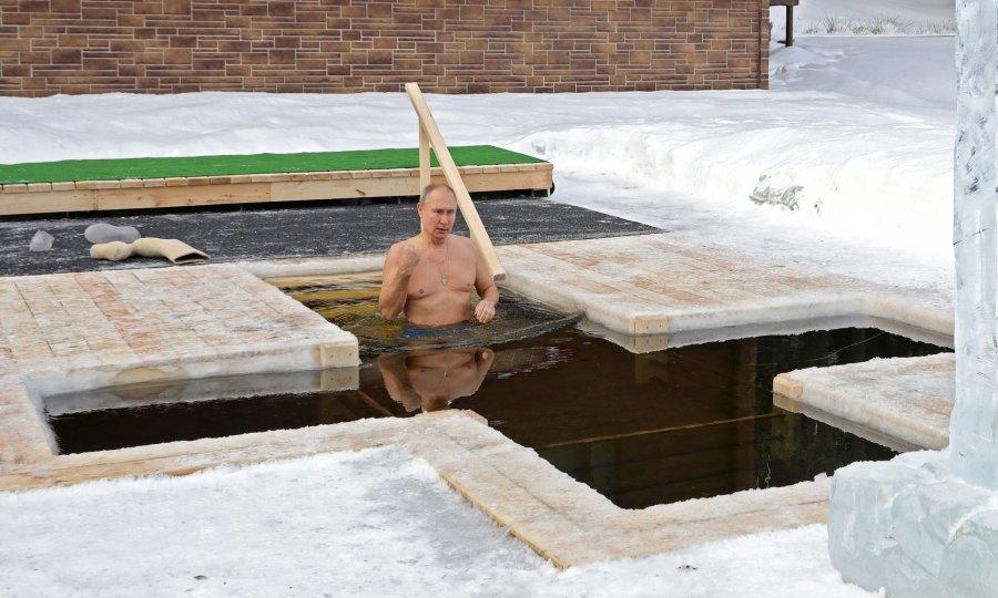 Putin takes icy plunge to mark Orthodox Epiphany