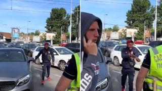 Video / Bizarna scena iz Beograda: Fudbaler zvezde kasnio na derbi i svađao se s policajcem